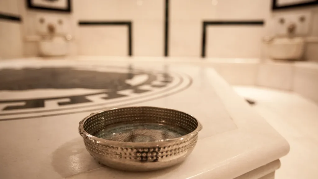 Solo traveler relaxing in a steam room during a private Turkish bath in Istanbul