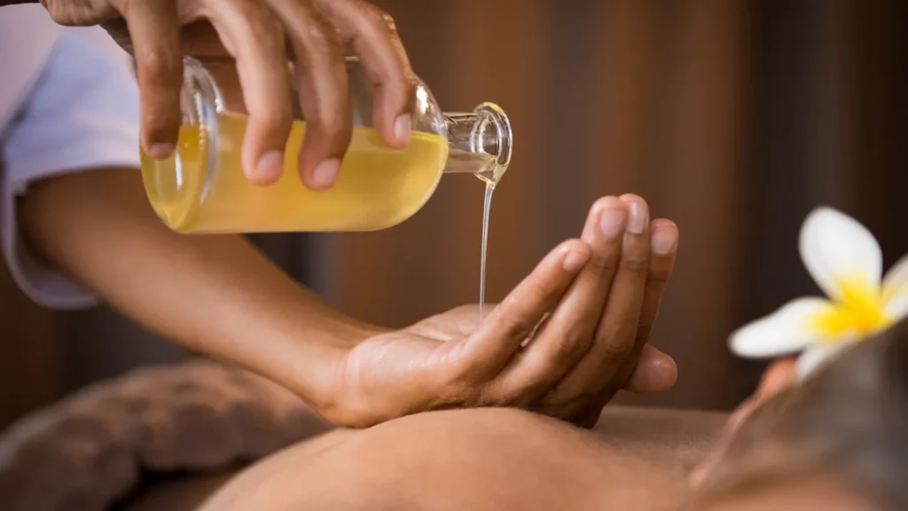 Couple enjoying side-by-side aromatherapy massage
