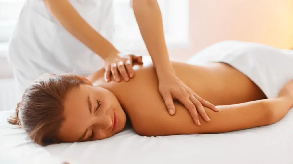 Luxury spa suite with aromatherapy oils and candles