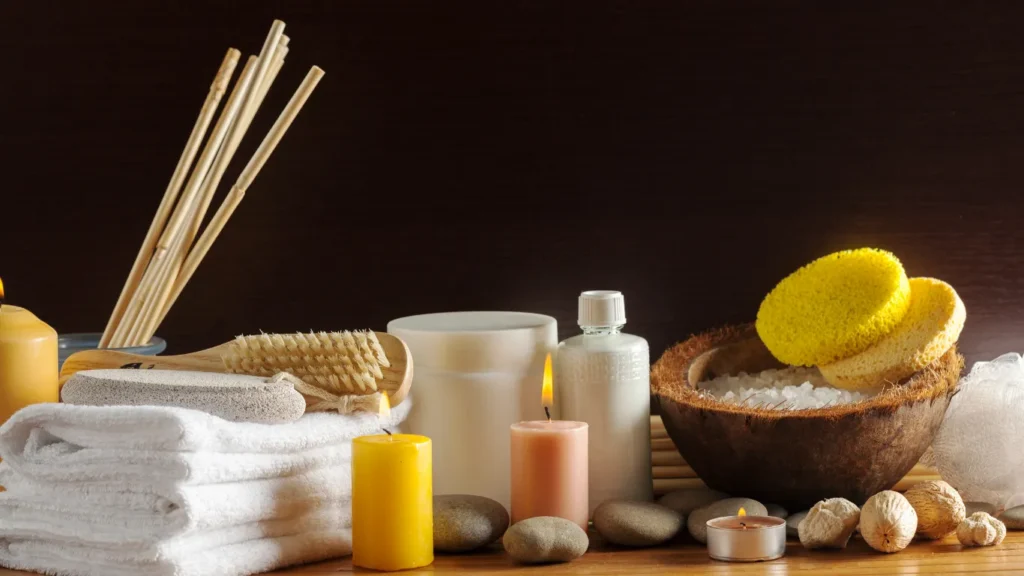 Therapist performing aromatherapy massage in spa room